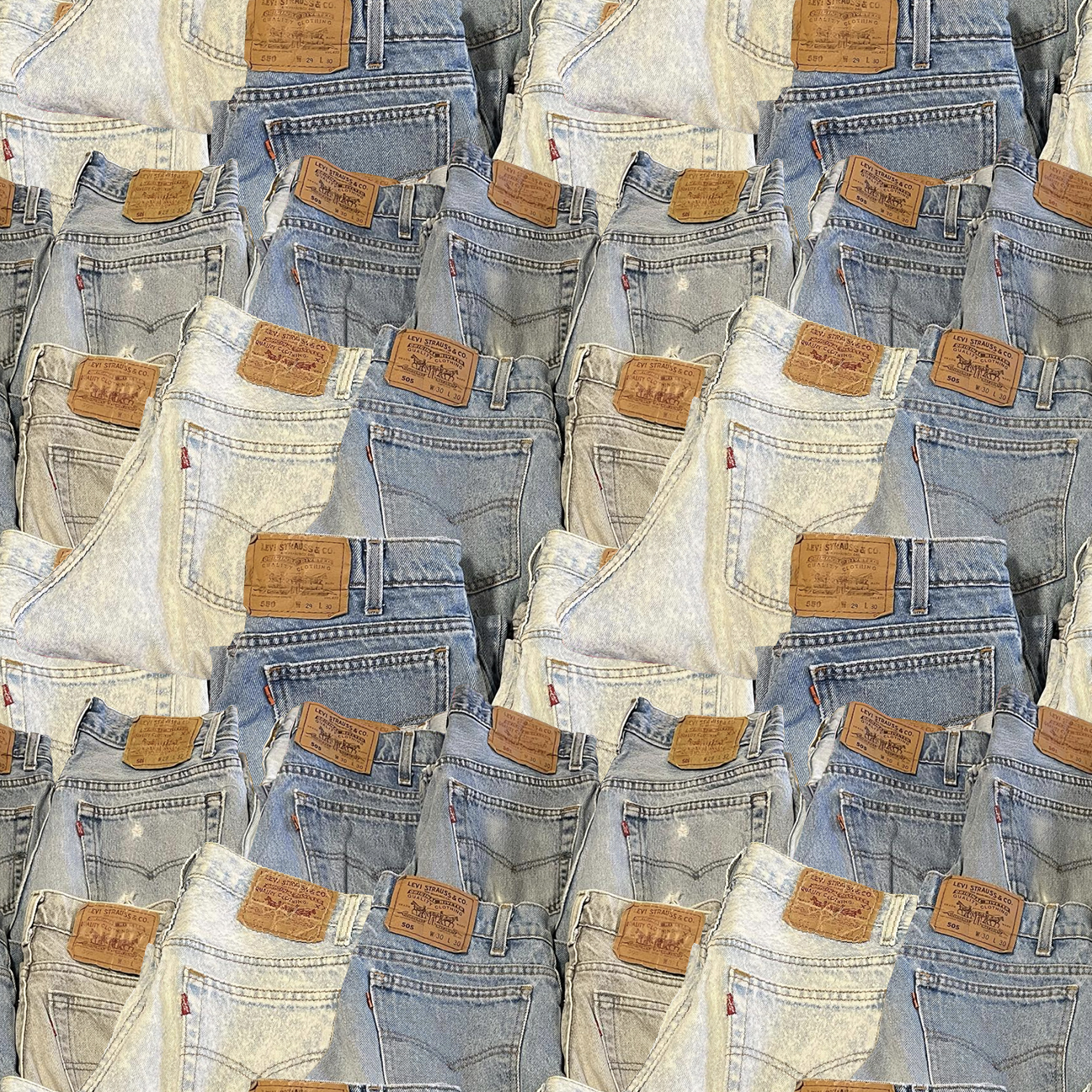 Scrolling image of pile of vintage Levi jeans